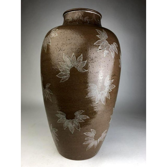 A impressively large and unusual stoneware vase in an urn shape from the studio of Japanese Potter Makuzu Kozan, also...