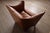 A beautiful pair of early edition lounge chairs model “Cayenne” in original cognac leather and coconut palm wood, made by...