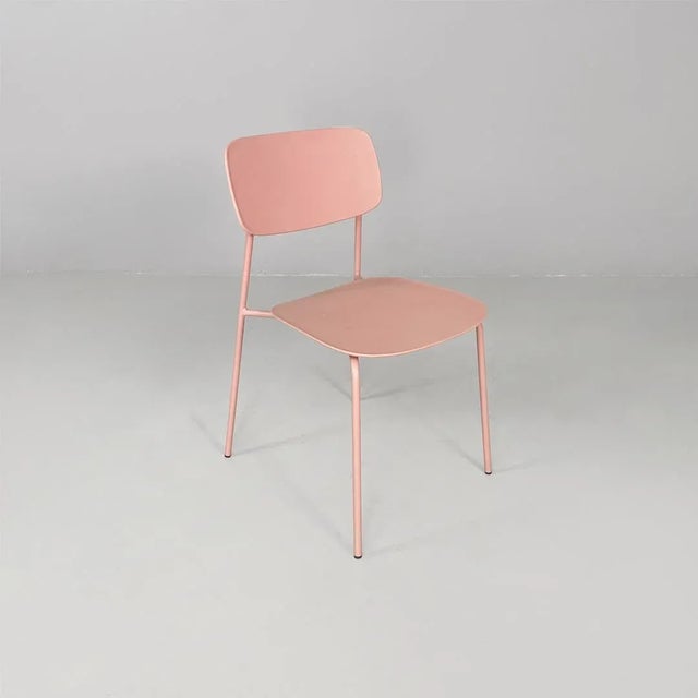 Italian modern light pink metal and plastic chairs for Tomasucci, 2000s Set of four metal and plastic chairs. The frame is...