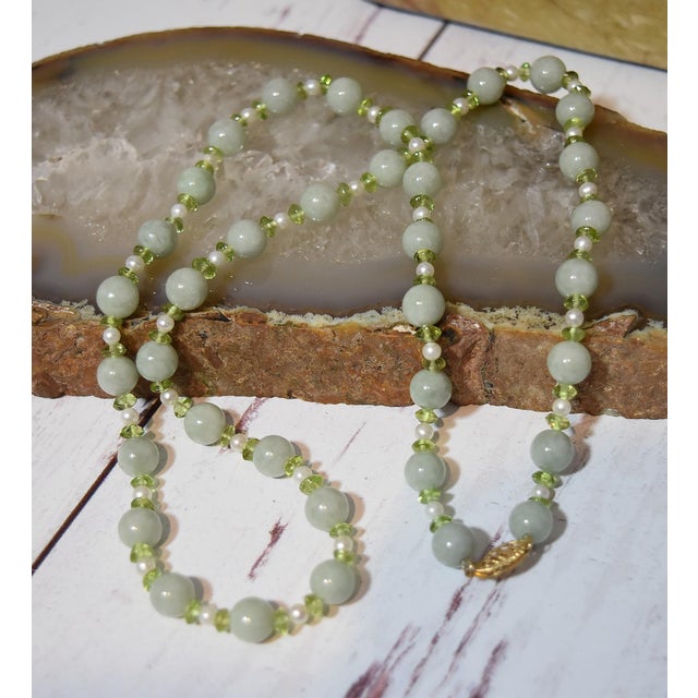 Natural Green Jadeite Beaded Necklace With Pearls, Peridot and 14k Gold Natural green Jade round beads are strung with...