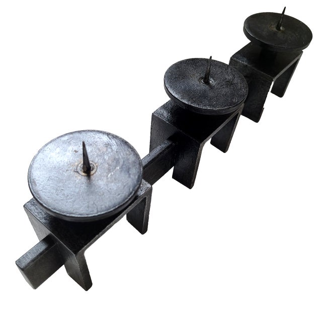 A unique, true vintage brutalist candle holder, likely from the 60s. A minimalist but substantial form, fabricated from...