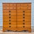 This is a large apothecary style dresser or chest of drawers stamped T.F.I. (Thomasville Furniture Incorporated) of High...