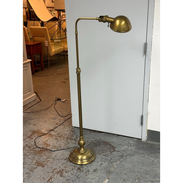 Design Plus Gallery presents a Pharmacy Task Floor Lamp from Pottery Barn. This floor lamp has an antique brass finish and...
