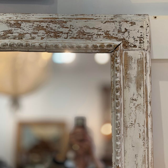 Wonderful Large French 19th c Pine Mirror with old glass, carved frame has beaded detail all around, some old worm holes,...