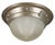 Industrial style flush mount ceiling light featuring a ribbed glass dome shade and a brushed steel base with visible...