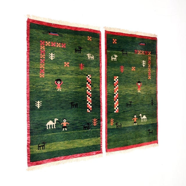 A stunning pair of vintage Gabbeh rugs. We would date them to around the mid-twentieth century. They were retailed in...