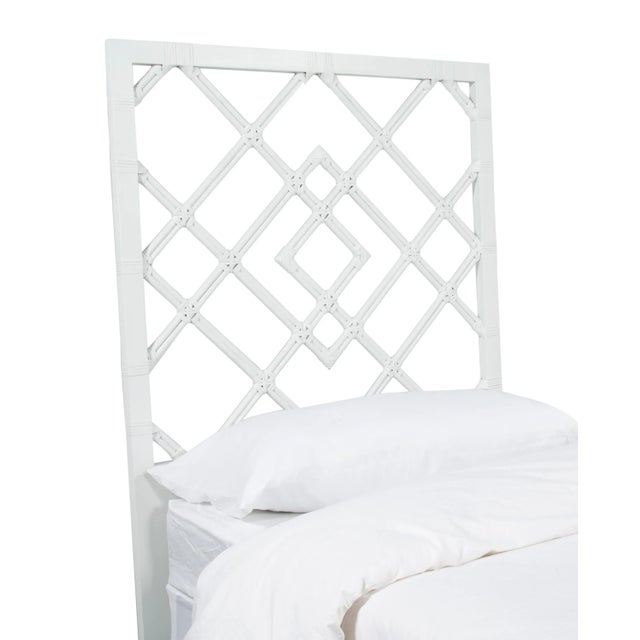 This headboard features classic Rattan design in a geometric pattern. Constructed of solid rattan and hand bound with...