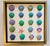A jewel-box collection of the sea. This one-of-a-kind dimensional artwork features an assortment of individually hand-...