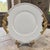 The Limoges L. Bernardaud gilded handles floral border platter is a vintage piece of porcelain dinnerware exudes elegance...