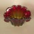 This red and green Murano glass bowl has a wavy edge in the shape of a shell. The shell can sit vertically or at 45...