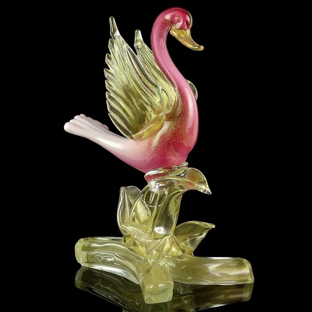Beautiful and large, vintage Murano hand blown deep pink over white, and gold flecks Italian art glass bird sculpture. The...