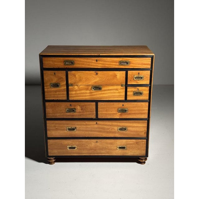 English military / campaign chest of drawers. Originally from England. This piece of furniture was used in the English...