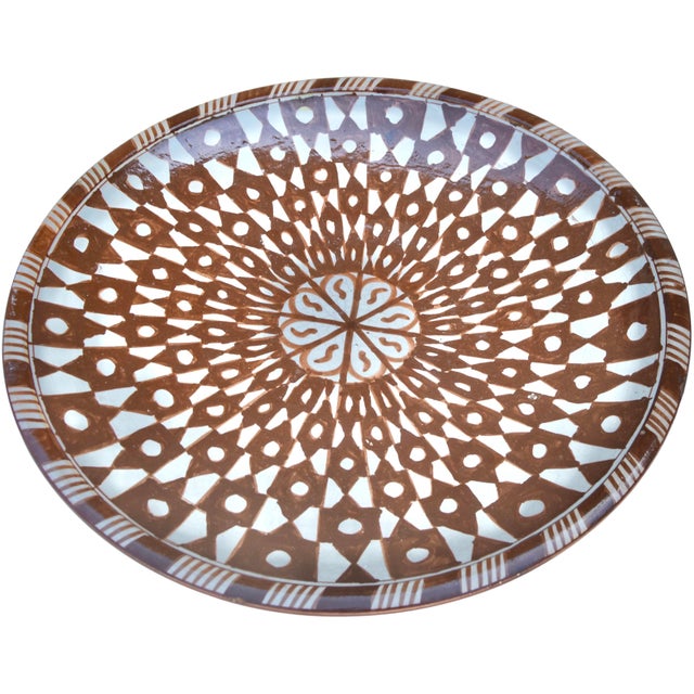 One-of-a-kind antique handcrafted and glazed Moroccan ceramic plate from Sefrou. Featuring an elaborate hand-painted fine...