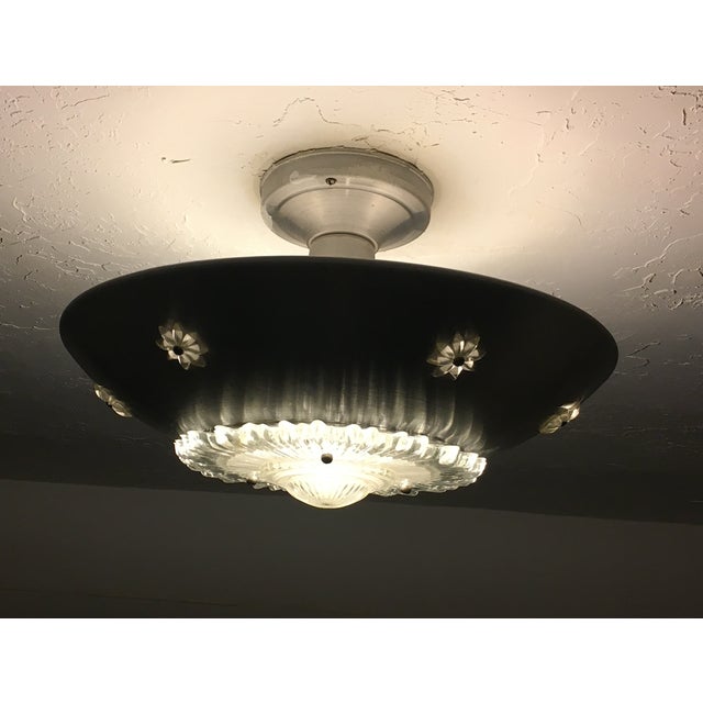 Found in a 1940s addition to an 1920 historic home in Salt Lake City, this one vintage ceiling light fixture will adorn...