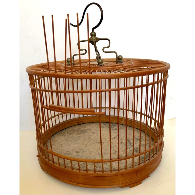 This birdcage takes me back to when I was in China and saw men arriving at a park with their pets in these cages on the...