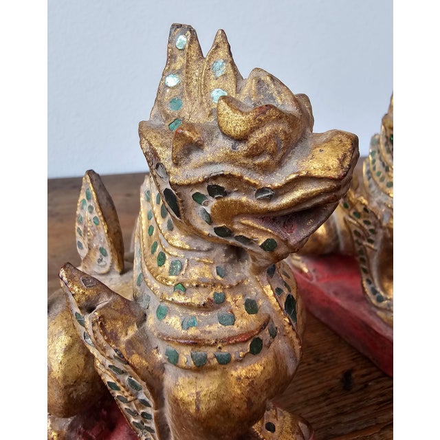 Gold Antique Southeast Asian Burmese Glass Jewel Inlaid Qilin Foo Dog Lion Figure Carvings - a Pair For Sale - Image 8 of 12