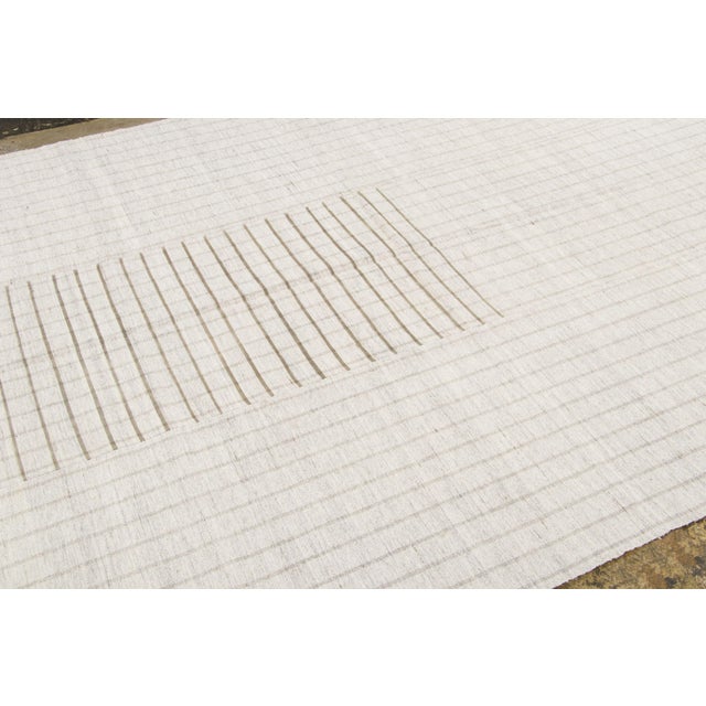 Handwoven in wool and originating circa 1950-1959, this 6x9 vintage Turkish kilim rug joins Rug & Kilim’s Kilim & Flat...