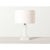Alabaster table lamp with sculptural geometric base and round paper shade. Holds two medium base light bulbs. Lamp can be...