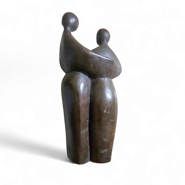 Solid Bronze figures / family with child 1960s Solid Bronze figures / family with child 1960s Height 30 Width 14 Depth 10 cm