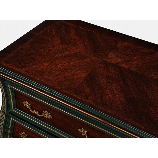 A dramatic vintage Bombay-style three-drawer chest professionally reimagined in a luxurious Emerald City Mahogany finish,...