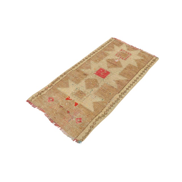 Vintage Handknotted decorative mini rug from Kars region of Turkey. Approximately 45-55 years old. In very good condition.