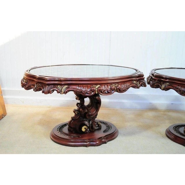 Vintage Hollywood Regency Mediterranean Style Carved Syroco Glass Top Low End Tables. Item features nice carvings...