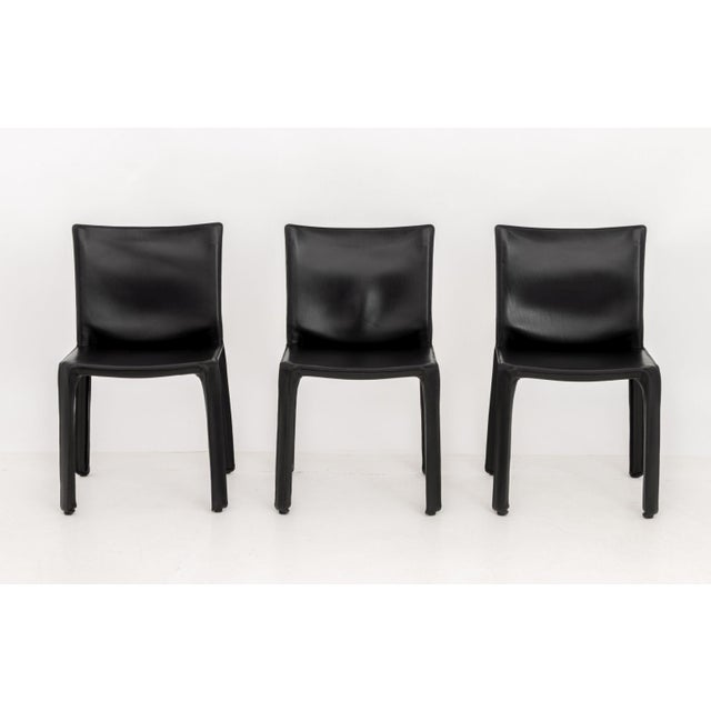 Set of Six Mario Bellini for Cassina "Cab 412" Side Chairs, the black leather on steel frame, marked "Cassina" to...