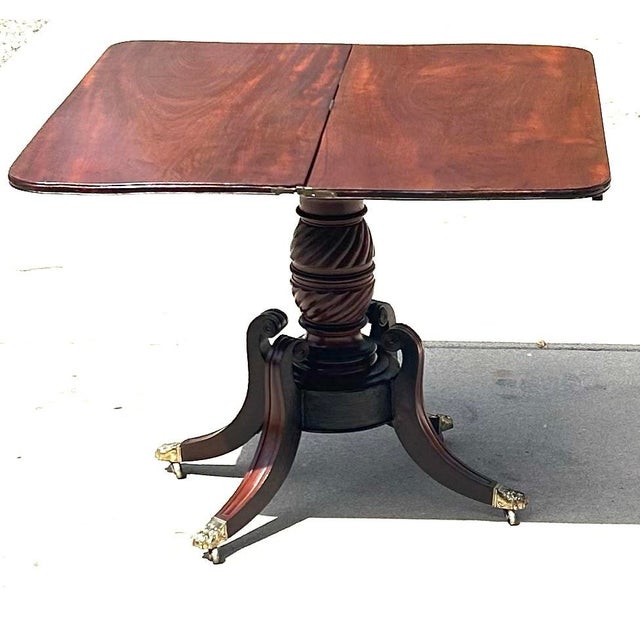 Antique Flame Mahogany, Regency-Style, Flip-Top, Rotating, Game Table, W/Hidden Drawer, Carved Pedestal, Brass Claws and Casters. C1810 to 1820 For Sale - Image 11 of 12