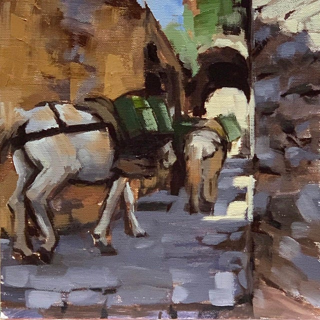 The painting captures a serene moment in a narrow pathway, where donkeys laden with green packs navigate through sunlit...