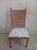 Vintage ladder back dining chair, featuring a wood frame and a floral upholstered seat Style: Traditional Color: Brown...