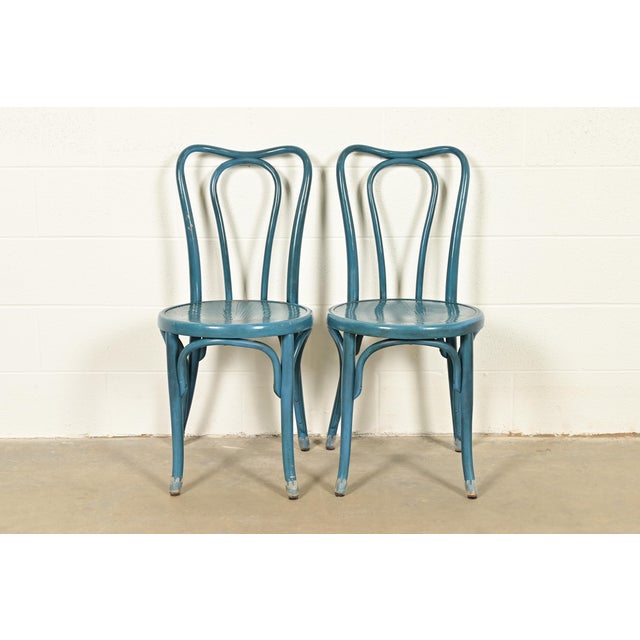 A beautiful pair of antique teal lacquered bentwood bistro chairs or dining chairs In the manner of Thonet By Jacob &...