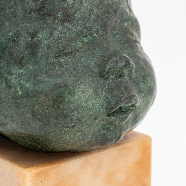Jacob Epstein Style Sleeping Baby Verdigris Patinated Bronze Sculpture, numbered edition "1 / 8" to the underside of the...