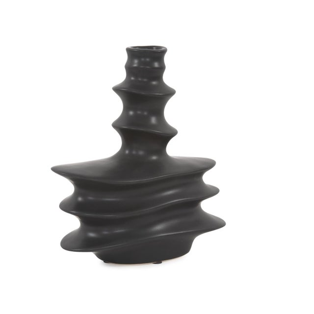 Sculpture Robert Cairn was a master of his shapes in ceramic that often created a sense of movement. He inspired us to...