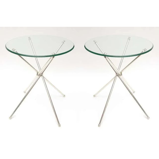 Silver plate and modernist are these chic, elegant and timeless side tables of silver plate and glass tops. They are...