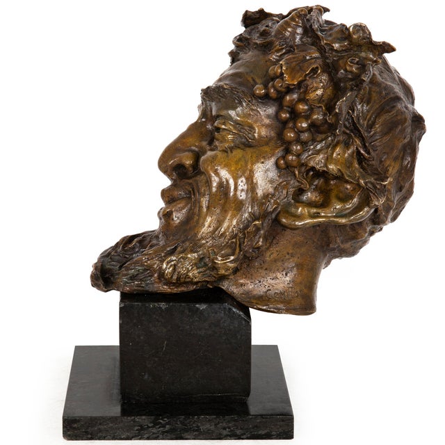 A BRONZE HEAD OF A SATYR Attributed to Vincenzo Gemito (Italian, 1852-1929) Lost-wax cast and patinated bronze raised on...