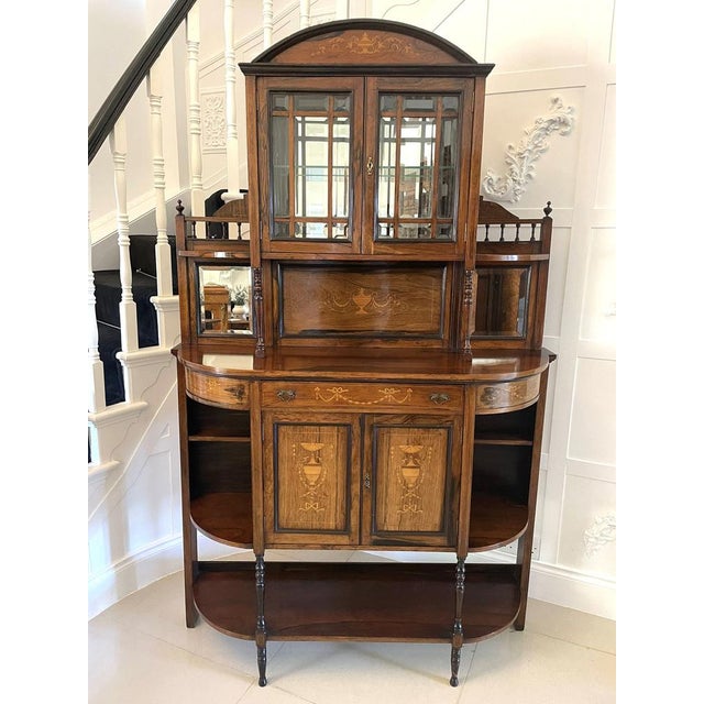 Antique Victorian quality rosewood inlaid side cabinet having an inlaid shaped pediment above a pair of astral bevelled...