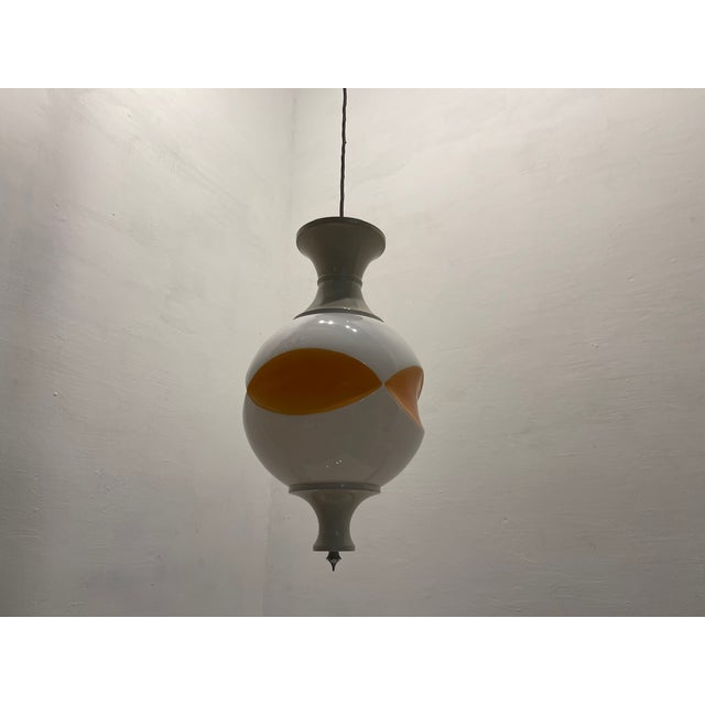 Set of 3 space age pendant lights in white opaline glass, italy, 1970s this striking set of three pendant lights was...