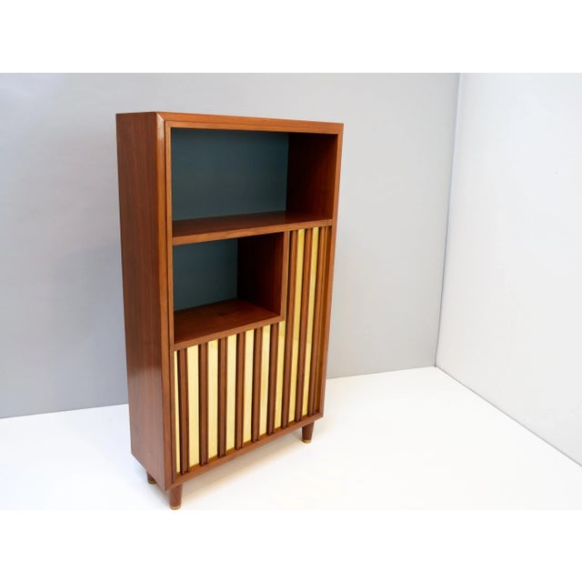 Amazing and rare bookcase / decorative storage with relief and brass front. Made in Sweden 1940s. They're no storage...