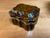 Borghese Ceramic lidded Box with a tourtise shell or marbleized finish. Gold trim with a blue interior. Beautiful simple,...
