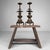 A decorative set of Japanese Buddhist altar candlesticks, butsudan shokudai, made from patinated bronze-coloured metal...