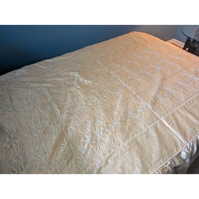 Ivory Satin fitted cover with embroidered floral motif. In excellent condition. Notes This comes with an appraisal...
