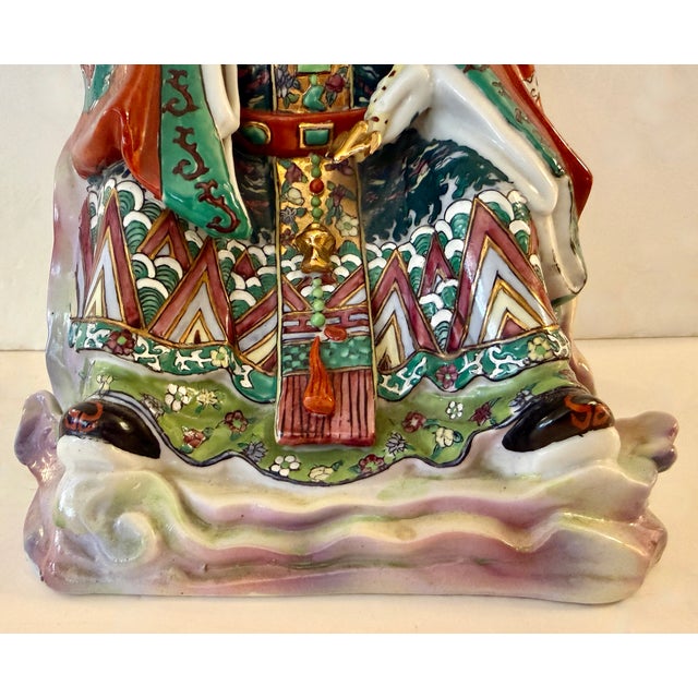 Vibrant Chinese polychrome glazed porcelain statue depicting Lu Xing (禄星), the Chinese stellar deity of prosperity,...