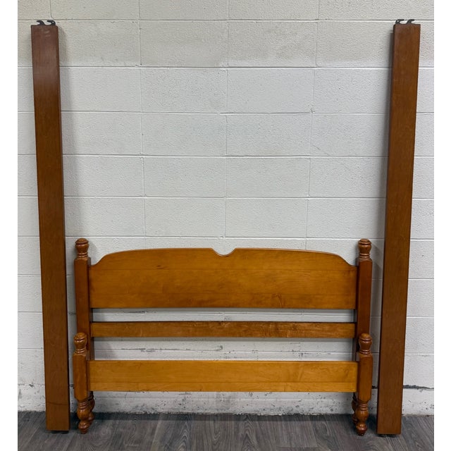 This is a beautiful full-size vintage solid maple Colonial-style low poster bed with turned posts, shaped headboard,...