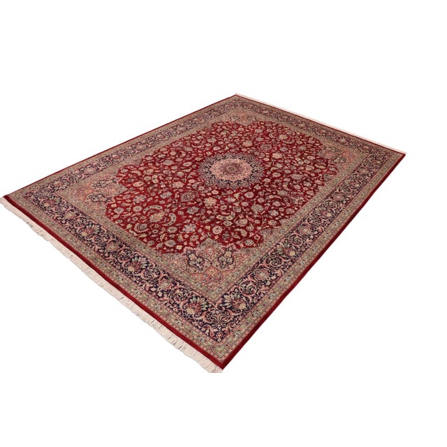 Designed with mesmerizing intricacy and gorgeous color palette, this hand-knotted masterpiece demonstrates the beauty and...