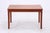 Vintage dining table by Grete Jalk for Glostrup with a clean mid-century design and warm teak grain. The rounded edges and...