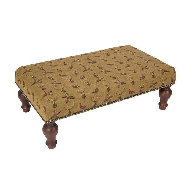 Hand upholstered in the UK with classical studding and hand polished solid beech legs, ideal for an extra seat or a centre...