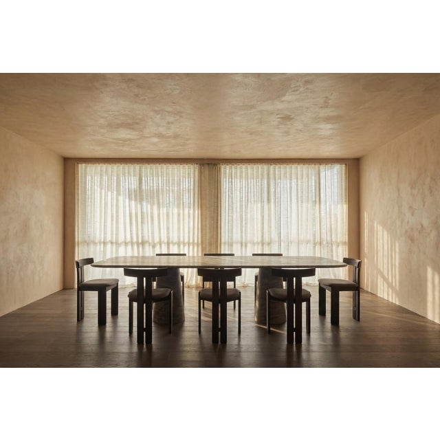 This Large minimalist table is made from solid, Silver travertine, featuring a rectangle table top that balances perfectly...