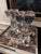 A striking pair of vintage Baccarat crystal candlesticks designed by noted French sculptor Robert Rigot. Each features a...