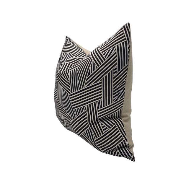 Pair of handcrafted pillows fashioned with Dedar Short-Cuts in Quasi Nero fabric on the front and backed in a flax colored...