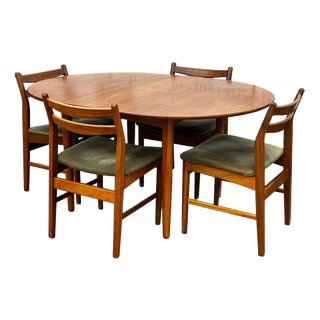 Mid-Century Modern Circular Extendable Oval Dining Table and Dining Chairs, Set of 5 For Sale